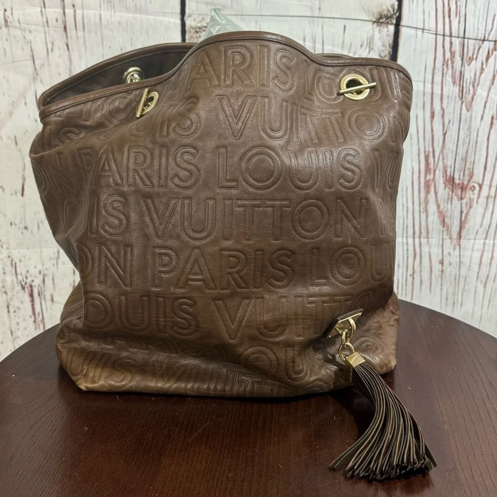 Louis Vuitton Paris Souple Whisper PM Chocolate Embossed leather bag limited